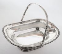 A George III silver swing- handle bread basket, maker Rebecca Emes & Edward Barnard, London,