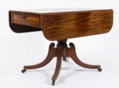 A Regency mahogany drop flap breakfast table:, the hinged top with rounded corners,