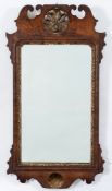 A 19th Century walnut and partly gilt fret cut wall mirror:,