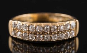 A gold and diamond two row ring: set with old-cut diamonds, approximately 0.