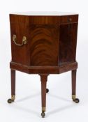 An early 19th Century mahogany and inlaid octagonal wine cooler:,
