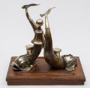 A late 19th century cow horn and  plate mounted partner's desk stand:  in the form of two dolphins
