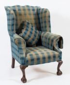 A mahogany wing frame armchair in the Georgian taste:,