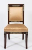 A 19th Century French Empire mahogany and brass mounted salon chair:,