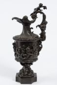 A 19th Century French bronze ewer: of neo-classical form, decorated with putti collecting fish ,