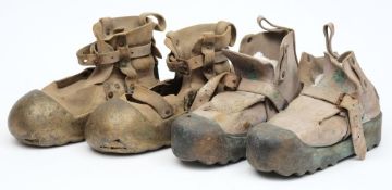 Two pairs of Swedish diving boots:, both having single piece sole with toe cap and leather upper.
