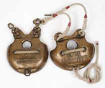 A pair of brass chest weights by C E Heinke & Co Ltd:, of typical form, signed as per title,