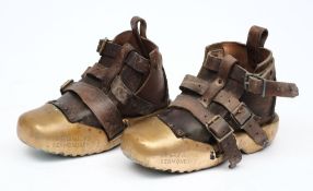 A pair of brass sand shoes by C E Heinke & Co Ltd, London:,