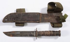 A US Navy Mark 2 diver's knife by Camill:, standard pattern with fullered clipped back blade,