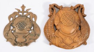 A cast brass US Army Master Diver plaque together with a wooden carved US Army Diver 1st class