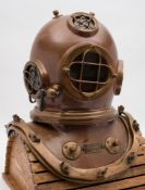 A 12-bolt diving helmet by Person, Sao Paulo, Brasil:, the circular observation windows with guards,