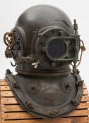 A 12-bolt copper diving helmet with later welding visor by Siebe Gorman & Co , London:,