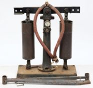 A two cylinder single acting double lever diving pump by Drager:,