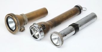 A French 'Aqualux' diving torch, a Universal torch by GEAG Ltd and a Russian diving torch:,