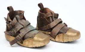 A pair of brass sand shoes by C E Heinke & Co Ltd, London:,