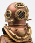 A full scale fibreglass reproduction of an A Schrader & Son Inc Mk V US Navy Standard diving