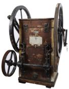 A motorised twin cylinder double acting two diver pump by Siebe Gorman & Co Ltd , London.