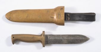 A brass and steel diver's knife by C E Heinke & Co, London:,