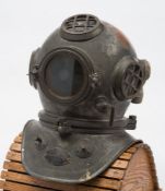A 3-bolt shallow water diving helmet by Siebe Gorman & Co, London:,