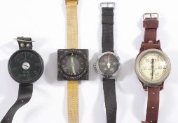 An Italian diver's depth gauge by Solent, two other depth gauges and a diver's compass by Sunnto:,
