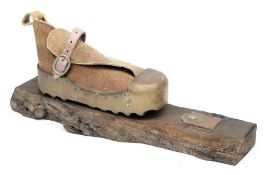 A Swedish commemorative brass diving boot:,