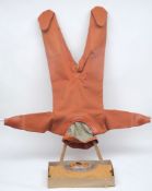 An unused Admiralty pattern 6-bolt diving suit and a lightweight 6-bolt diving suit by Siebe Gorman