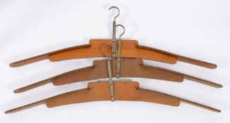 Three large diving suit hangers by Siebe Gorman & Co:, stamped as per title, 106cm wide.