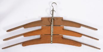 Three large diving suit hangers by Siebe Gorman & Co:, stamped as per title, 106cm wide.