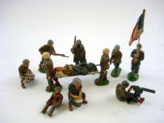 A collection of eleven Timpo WWII US Infantry figures including an Afro-American Marine figure:,