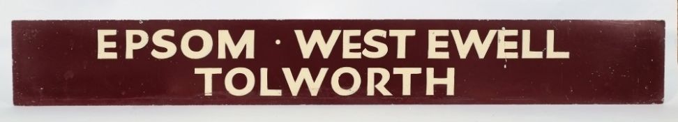 An enamel transport sign for 'Epsom, West Ewell, Tolworth':, white text re-touched, 16cm x 122cm.