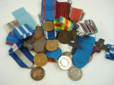A collection of Italian WWI & WWII service medals and other society medals:.