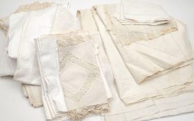 A collection of assorted table linen:, including cut work table cloths, crochet edge table cloths,