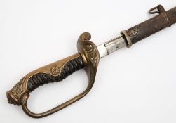 A WWII period Japanese Kyu Ganon:, the curved fullered blade with hamon,