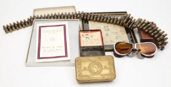 A 1914 Christmas tin together with a small group of militaria:.