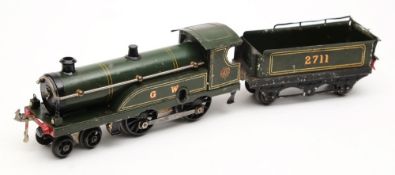 Hornby an 4-4-0 clockwork locomotive No 2711 and six wheel tender : in GWR green livery.