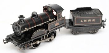 Bing, an 0-4-0 clockwork locomotive No 2663 and four wheel tender: in LNWR black livery.