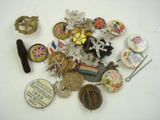 A Primrose league enamel badge: and a collection of various early 20th century badges.