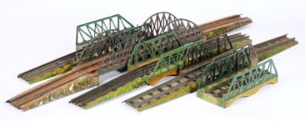 Four assorted complete girder bridges together with odd sections: various makers including Hornby