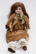 An Armand Marseille bisque head doll:,