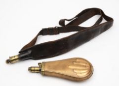 A late 19th century leather and brass shoulder belt powder flask together with a copper and brass