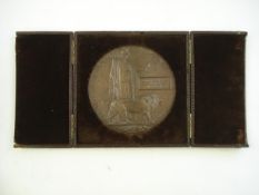 A WWI memorial plaque, Jeffrey Edwards Morton Michelmore in a brown leather case:.
