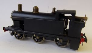 An O gauge 0-6-0 live steam tank locomotive : in BR black livery