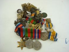 WITHDRAWN A WWI trio together with a collection of WWII service medals,