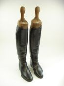 A pair of Tom Hill black leather riding boots with shoe trees, circa 1940:.