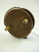 A 19th century mahogany and starback fishing reel by J Bernard & Son, London:,