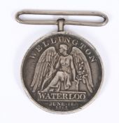 An 1815 Waterloo medal, indistinctly stamped 1st Batt. 27th Regt. Foot:, altered suspension..