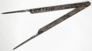 A pair of 17th century polished steel dividers: with scroll decoration, one arm initialled F.B.D.