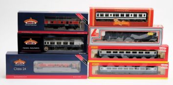 Bachmann, a class 24 diesel locomotive No 97201: in BR red/blue livery,