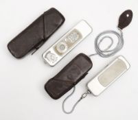 Two Minox subminiature cameras:, both with Complain 15mm lenses , one having light meter to one end,