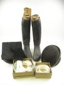 Three black felt bowler hats together with a mortar board,